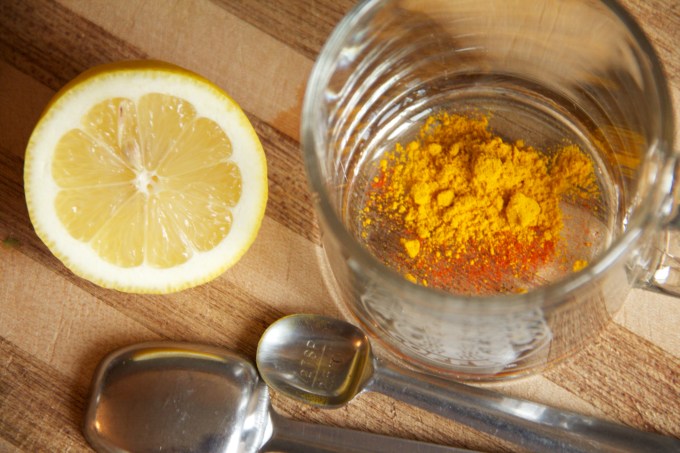 Hot Lemon Water with Turmeric, Cayenne, and a pinch of Salt and Raw Sugar